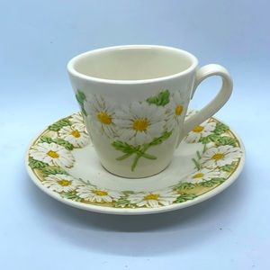 Metlox Poppytrail “Sculptured Daisy” Cup & Saucer Set. Cream, With Green/Yellow.